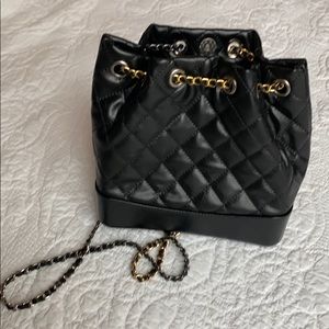 Black quilted leather bag/backpack